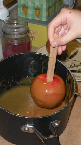 Making Caramel Apples - Dipping